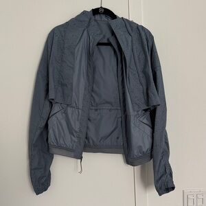 New Balance Women's Blue Hooded Convertible/Packable Jacket